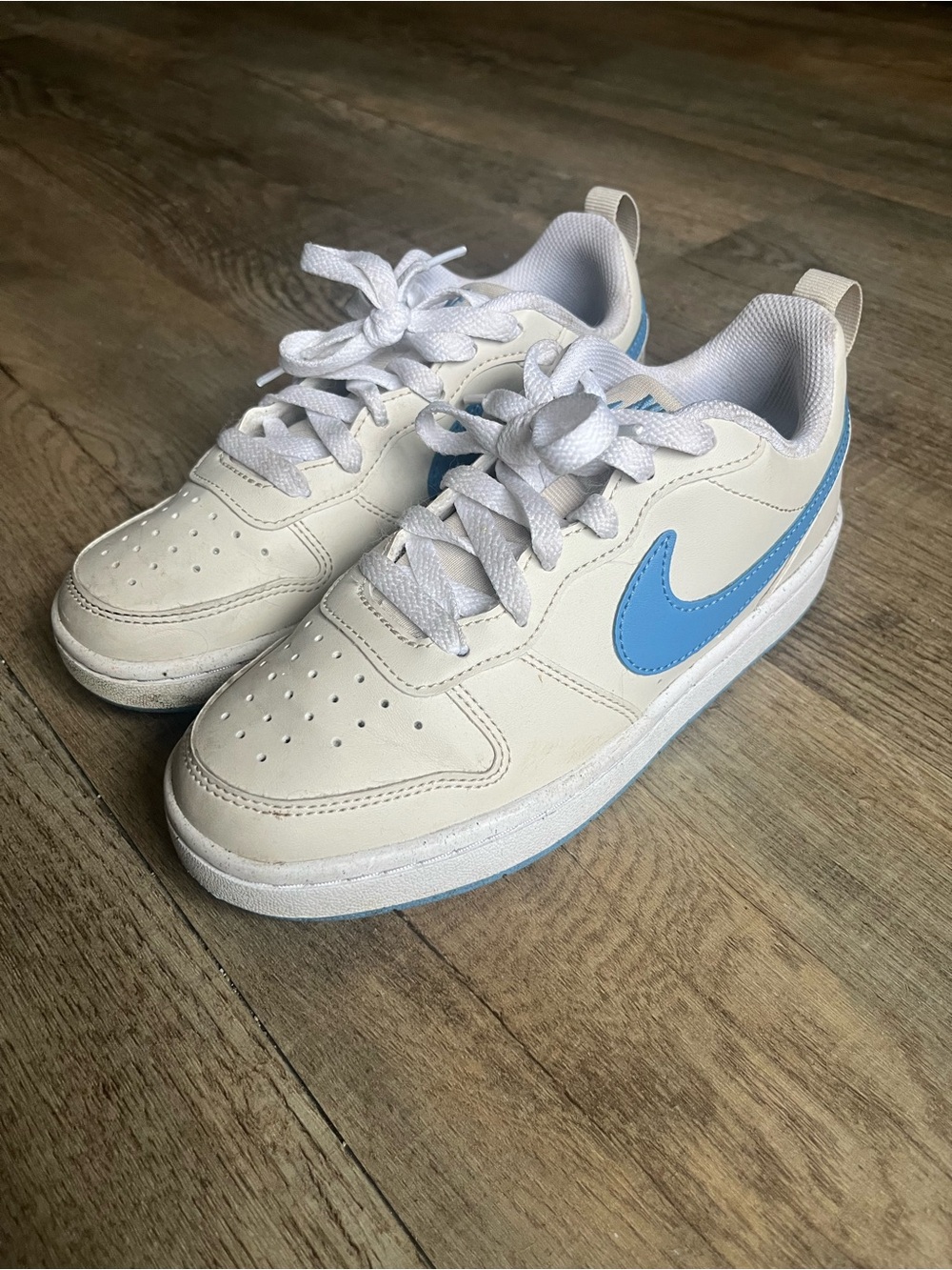Nike Kids White Sneakers with Light Blue Swoosh